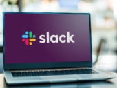 Laptop computer displaying logo of Slack.